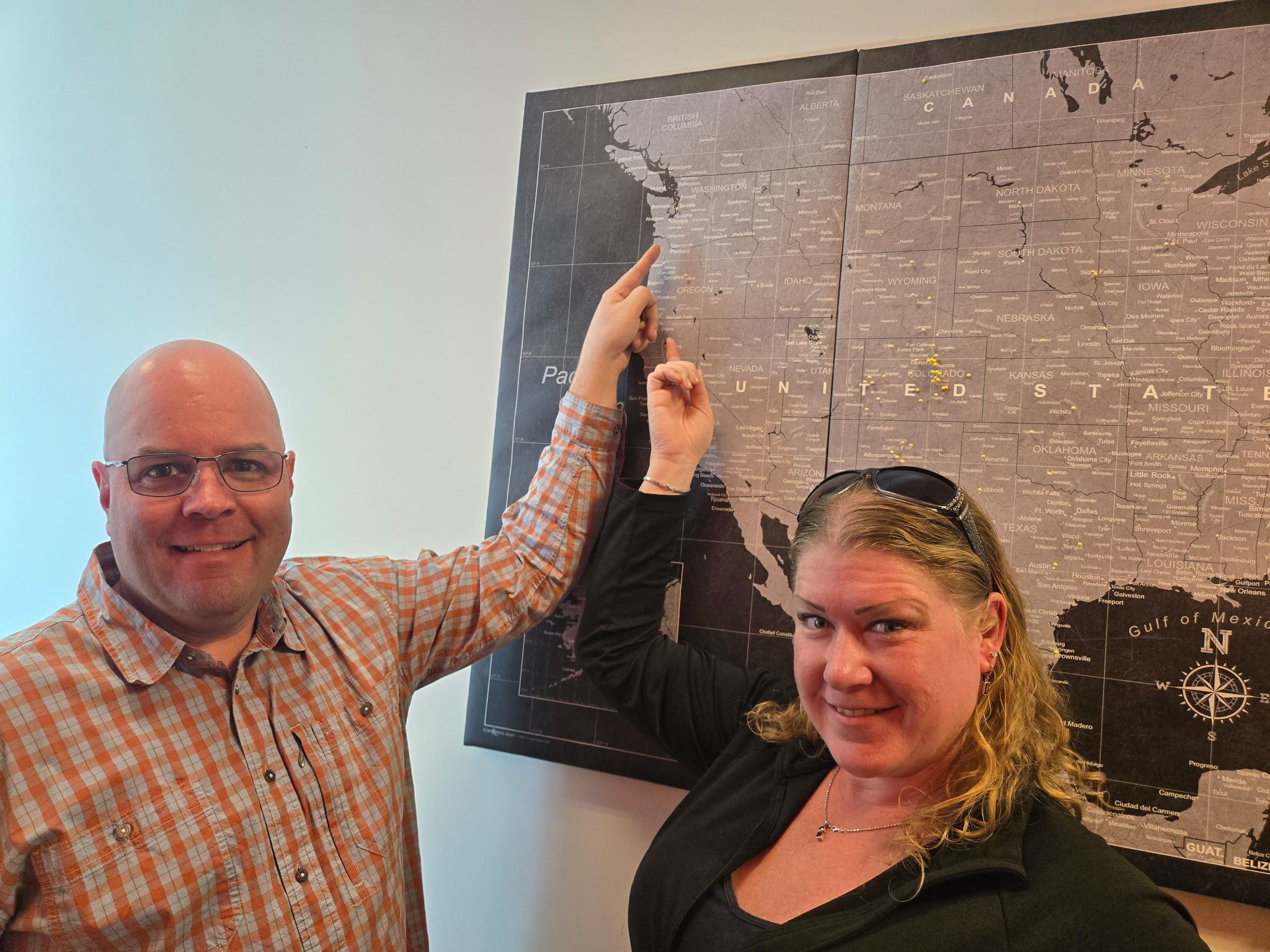 Customers pointing to where they traveled from on a US map